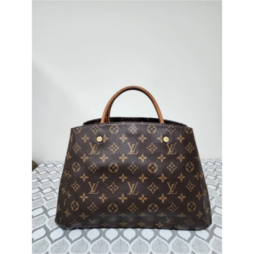 LOUIS VUITTON Monogram Canvas Montaigne MM Bag Brown